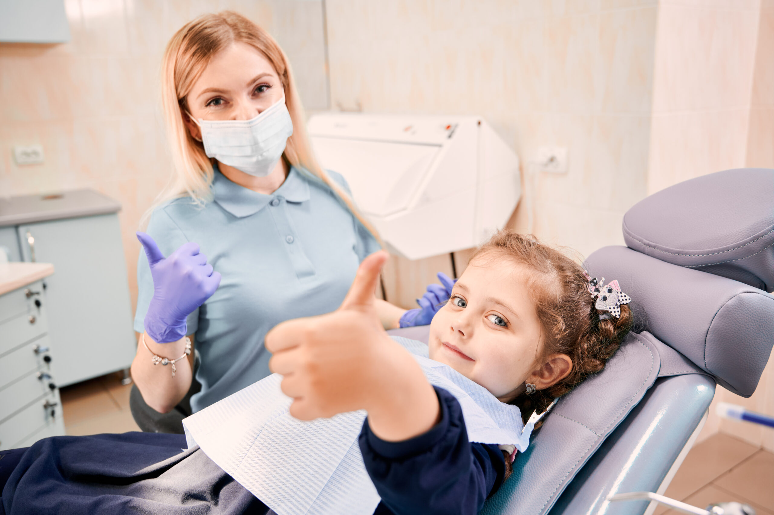 Happy child with a friendly dentist in chicago